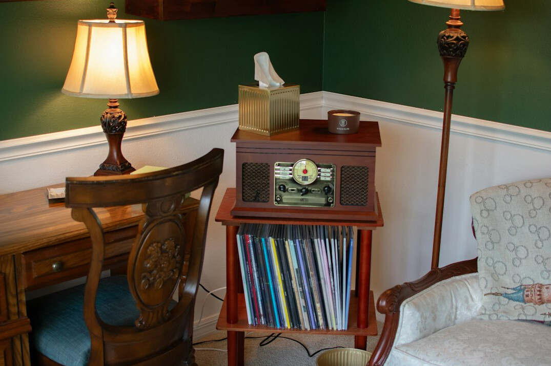 Quiet editorial office with wooden bookshelves