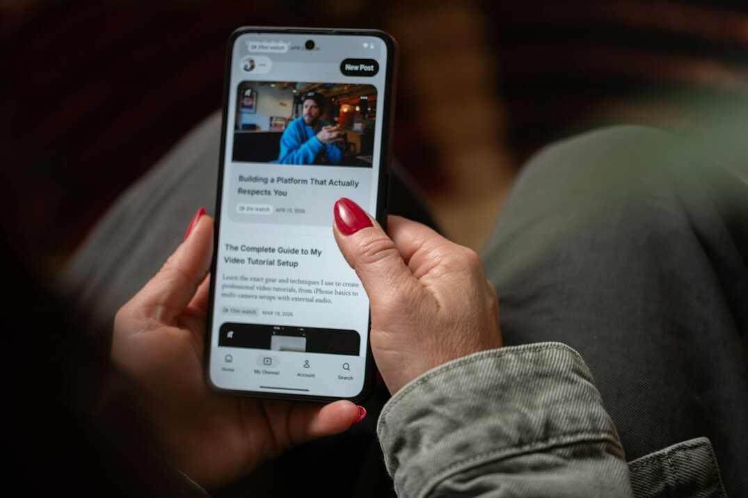 person reading news on phone